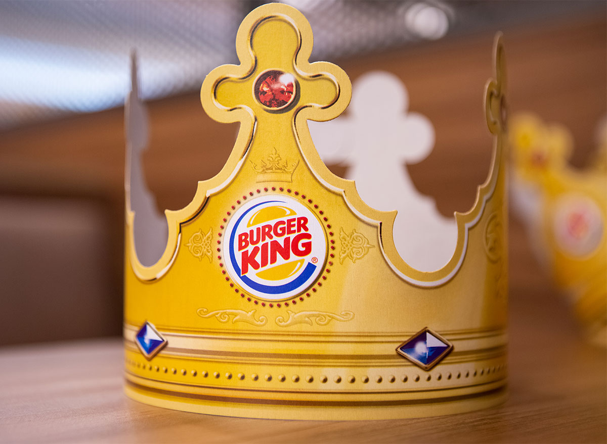 burger king paper crown on table