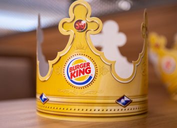 burger king paper crown on table