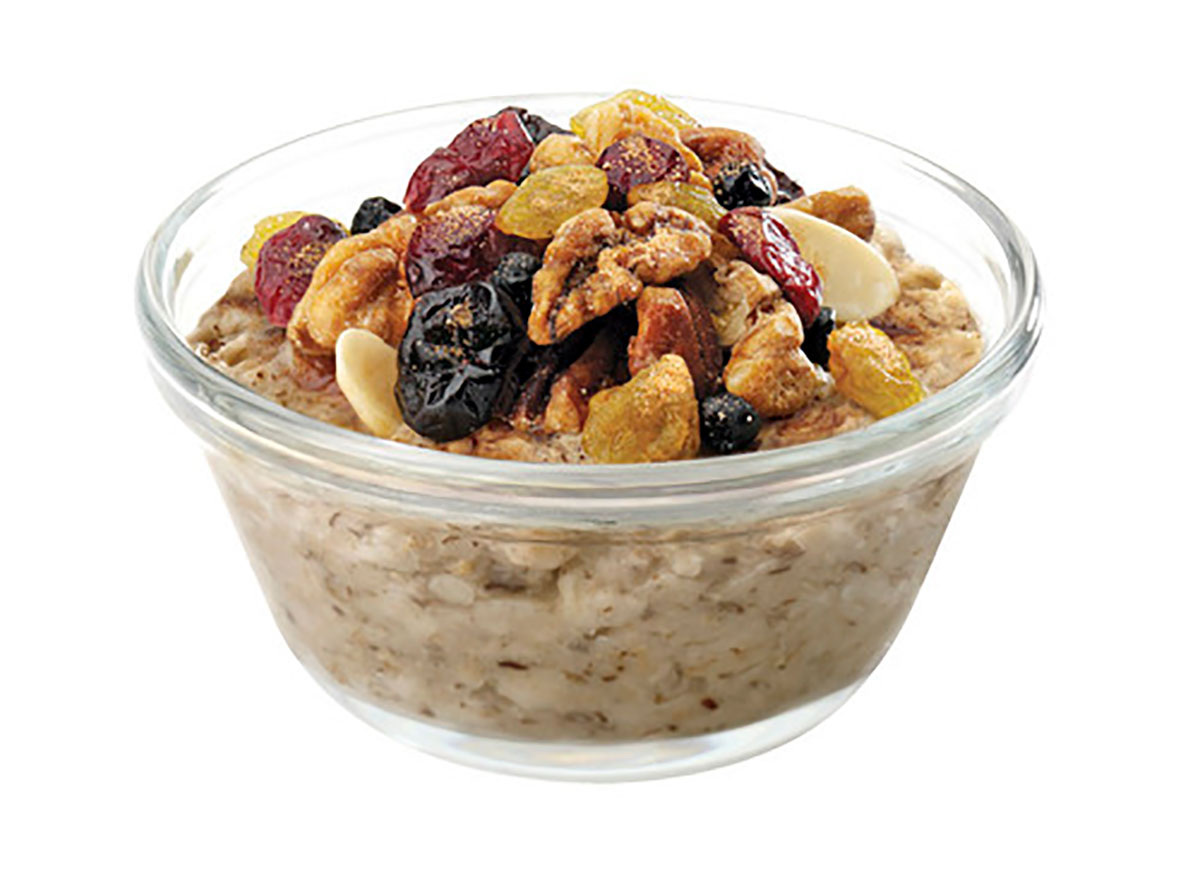bowl of chick fil a oatmeal topped with fruit and nuts
