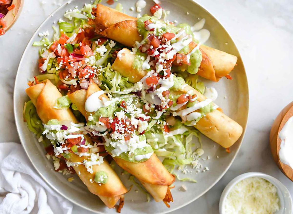 chipotle chicken taquitos on platter