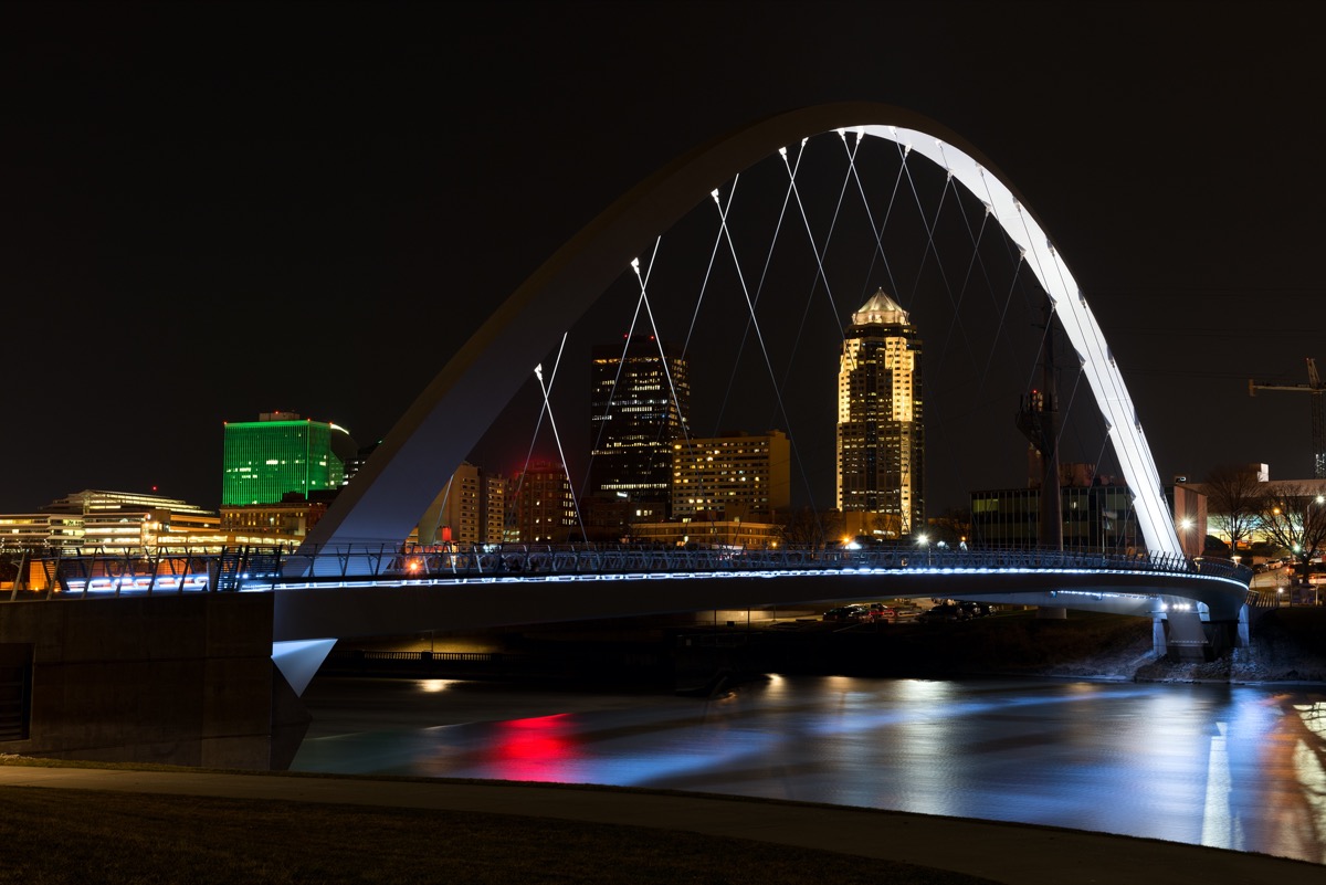 Downtown Des Moines Riverwalk Bridge At Night. Des Moines Iowa