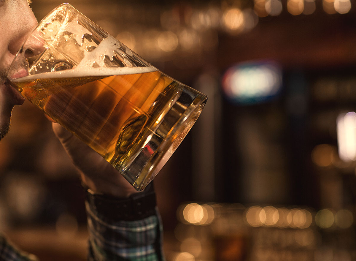 man drinking beer