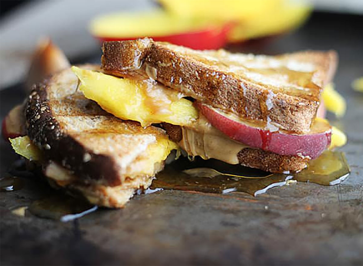 grilled peanut butter sandwich with peaches and mango