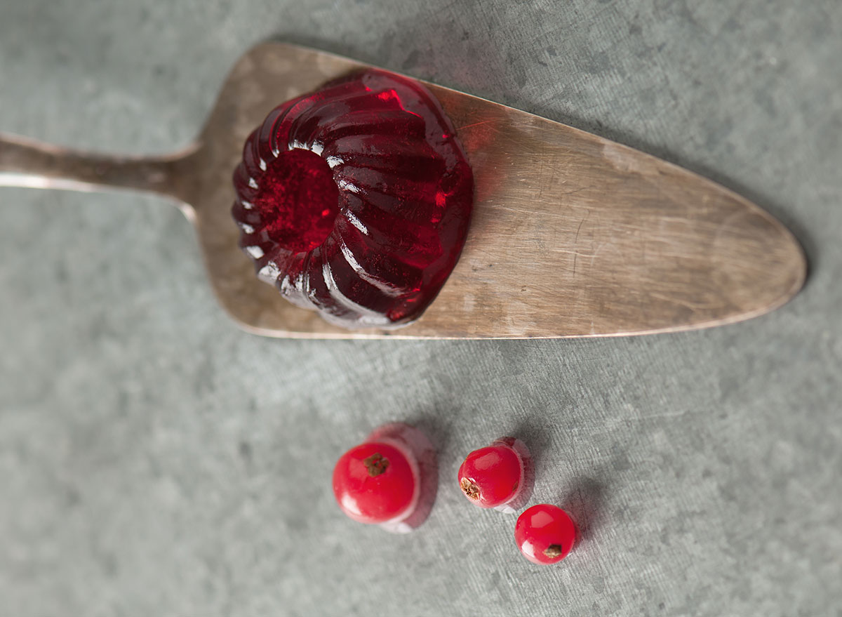 red jello mini bundt cake on serving knife