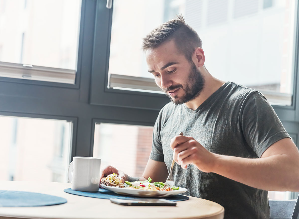 man eating