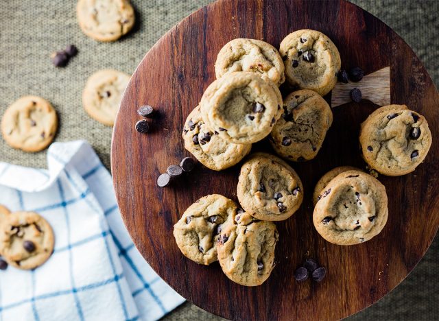 mini chocolate chip cookies on wood serving board