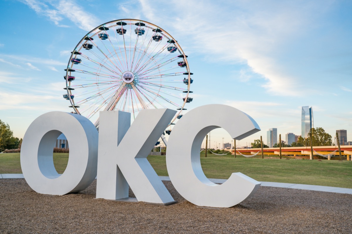Skyline of Oklahoma City, OK with OKC sign and ferris wheel