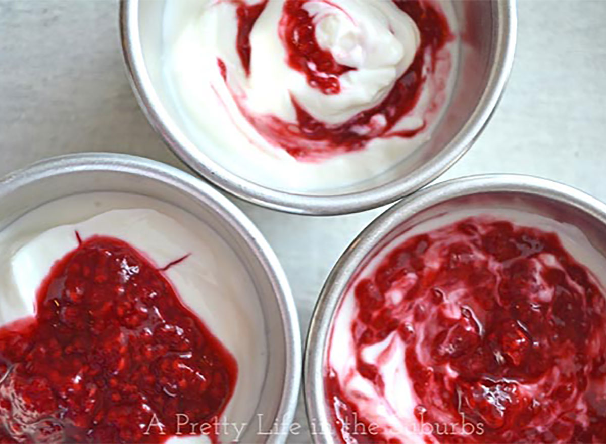 raspberry greek yogurt in three bowls