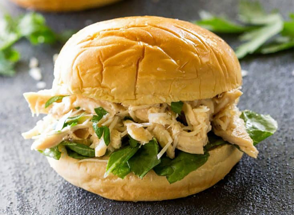 slow cooker chicken salad on brioche roll with lettuce