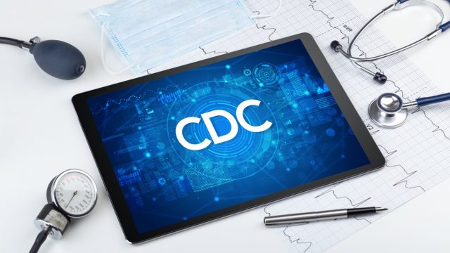Close-up view of a tablet pc with CDC abbreviation