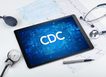 Close-up view of a tablet pc with CDC abbreviation