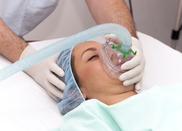 Woman patient receives anesthetic in hospital