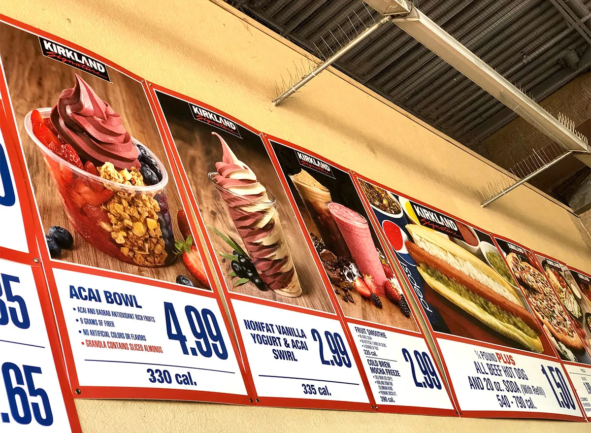 signs at costco food court showing acai bowl and frozen yogurt