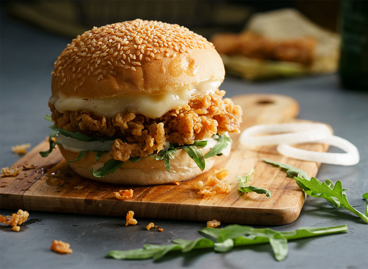 crispy chicken sandwich on serving board