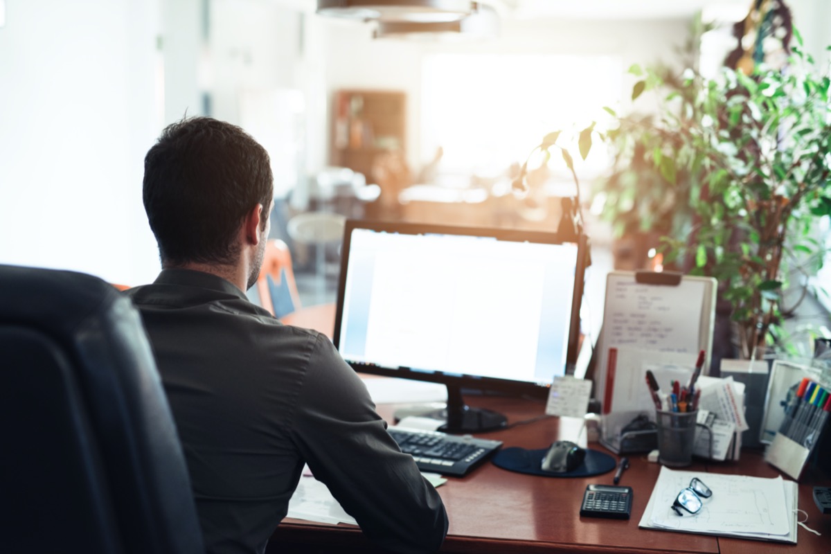 guy working at his computer