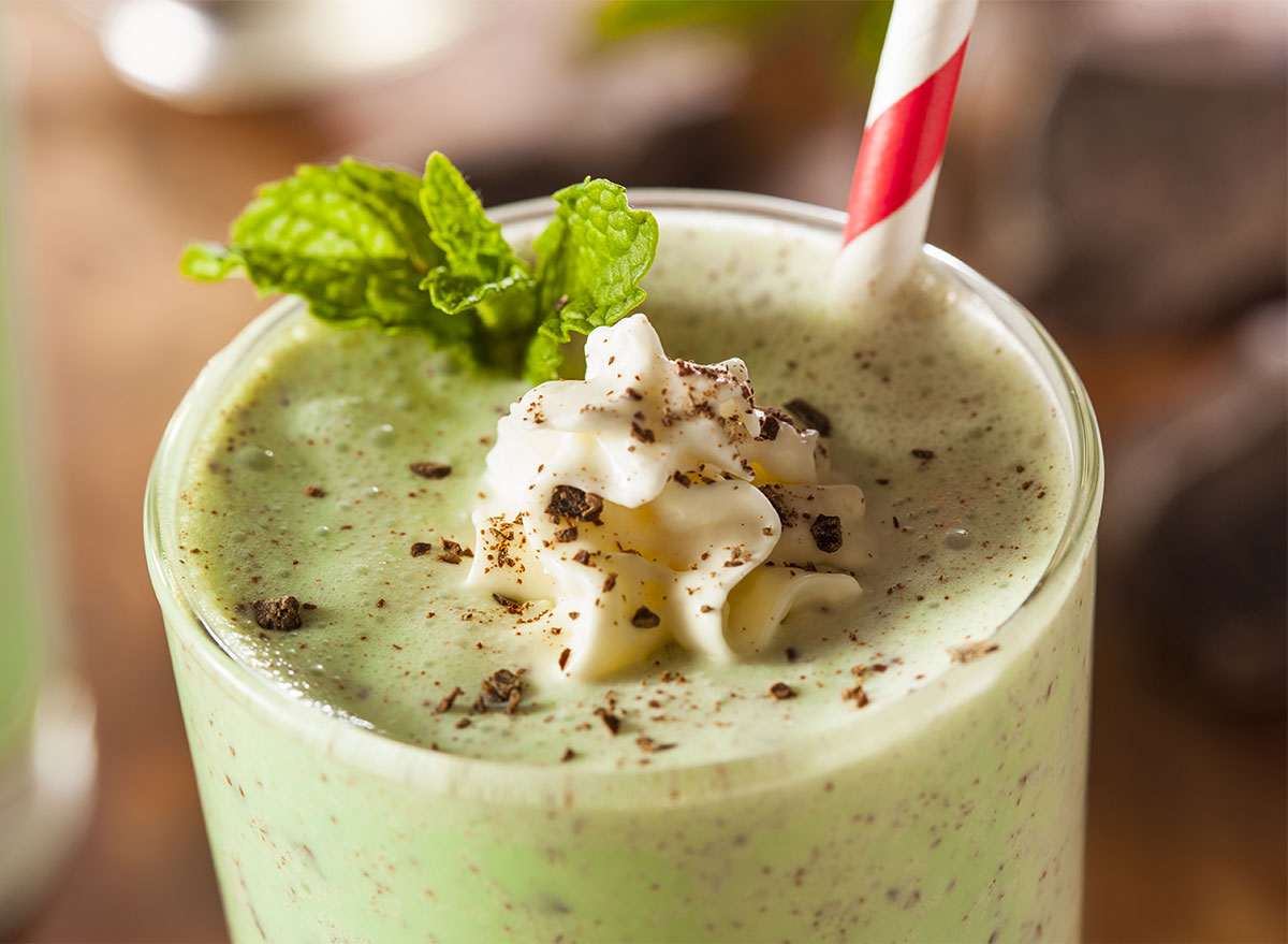 mint chocolate milkshake with red straw