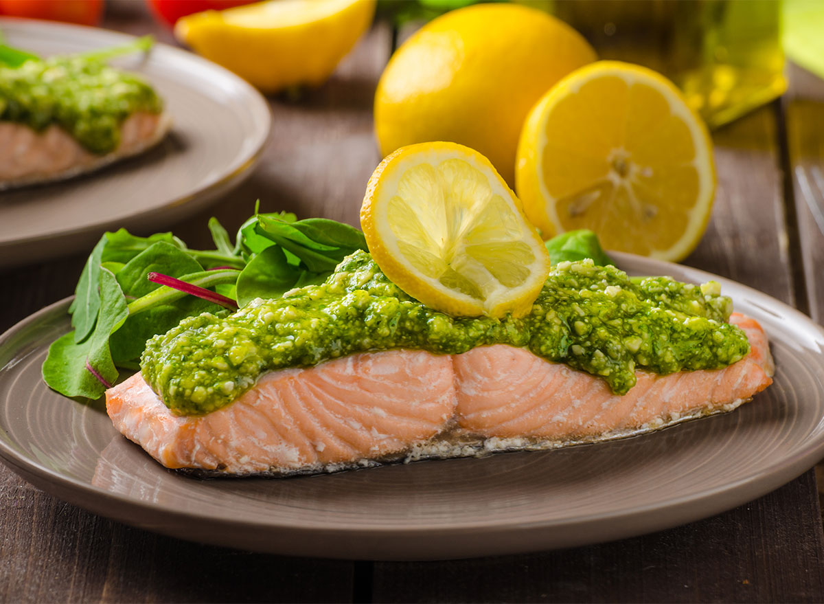 baked salmon with pesto and lemon slice