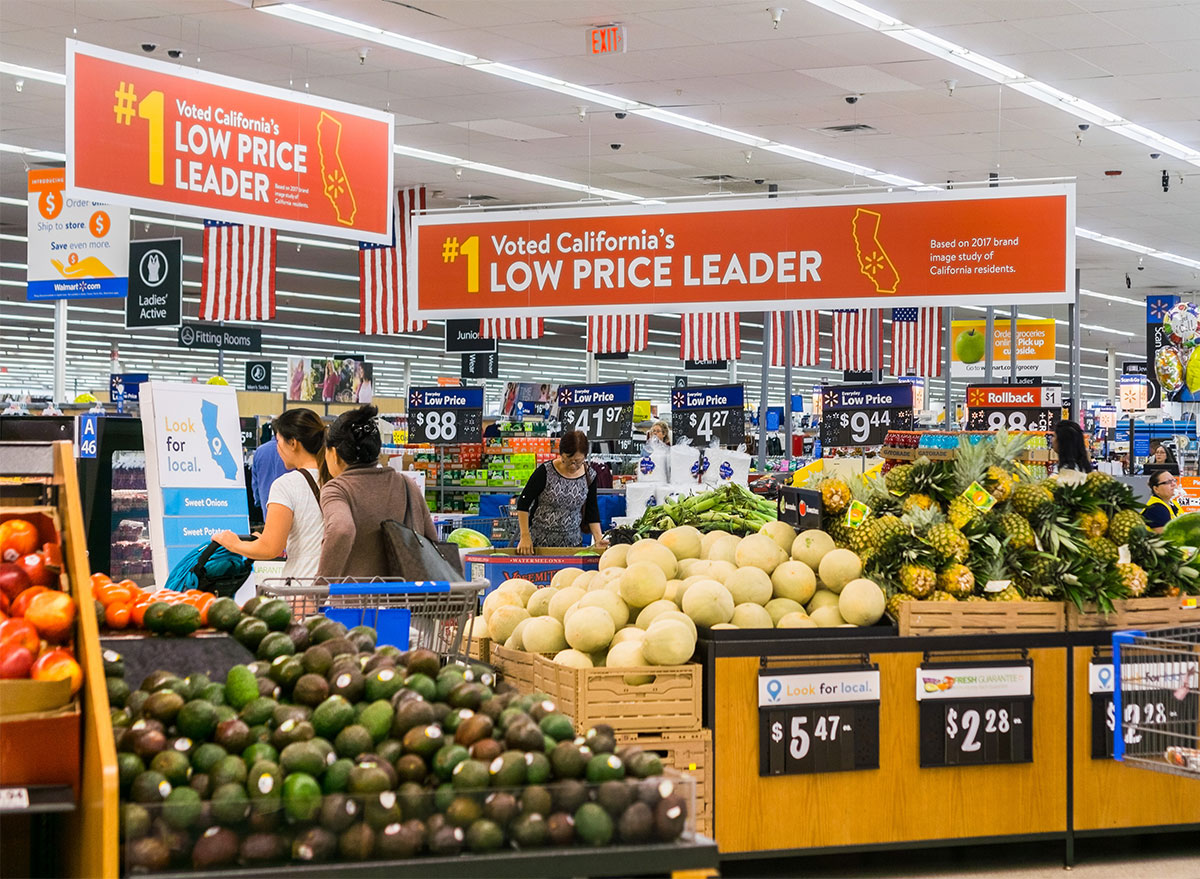 walmart produce section with clearance signs