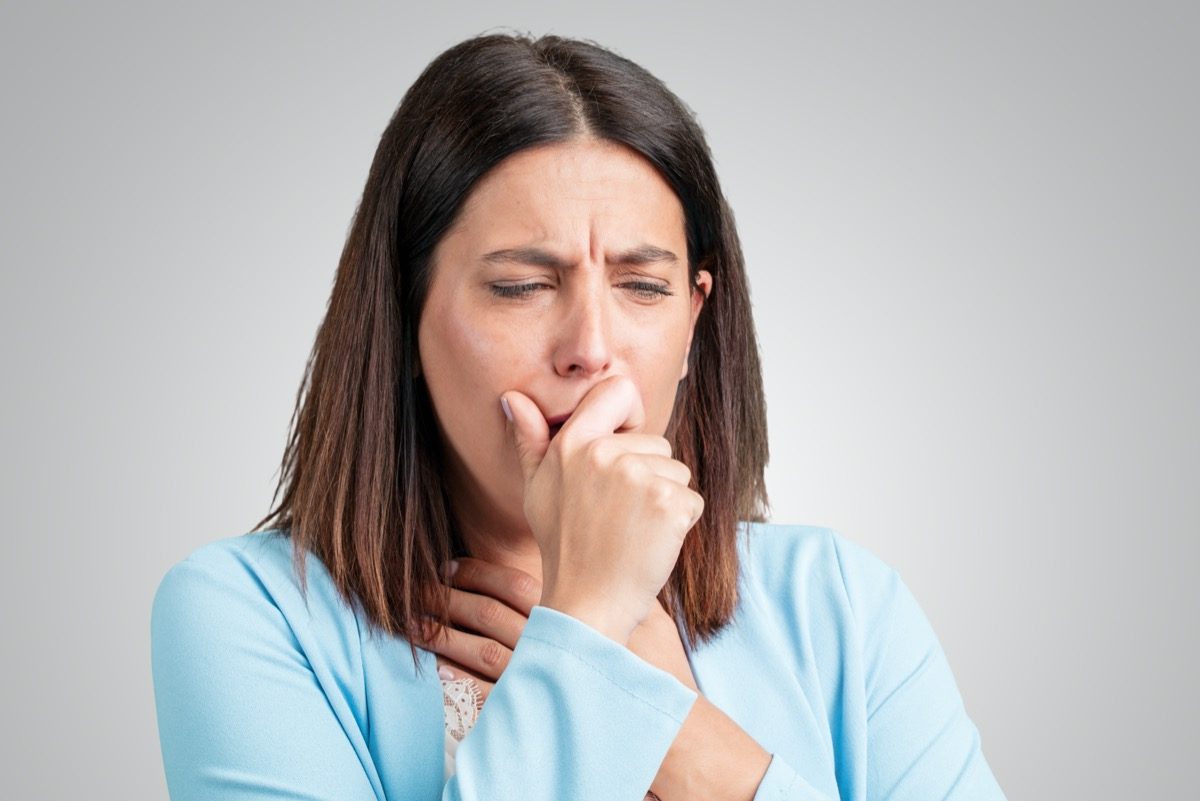 Woman cough sick ill cold fever