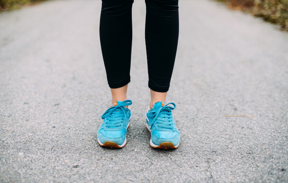 Female feet in sneakers