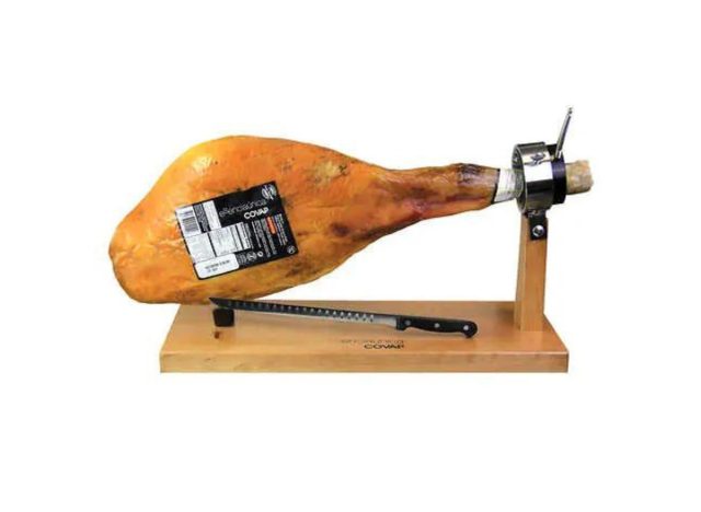 Costco Jamon Iberico on a stand with a knife