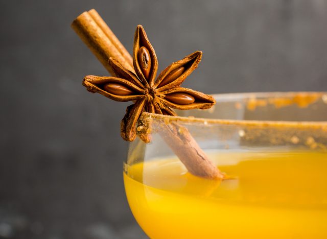pumpkin spice cocktail with a cinnamon stick