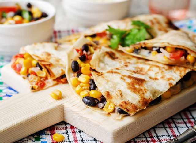 black bean corn quesadilla on a cutting board