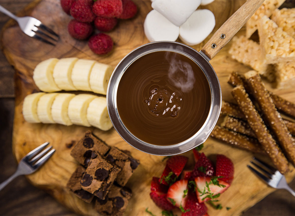 chocolate fondue with sliced strawberries and bananas