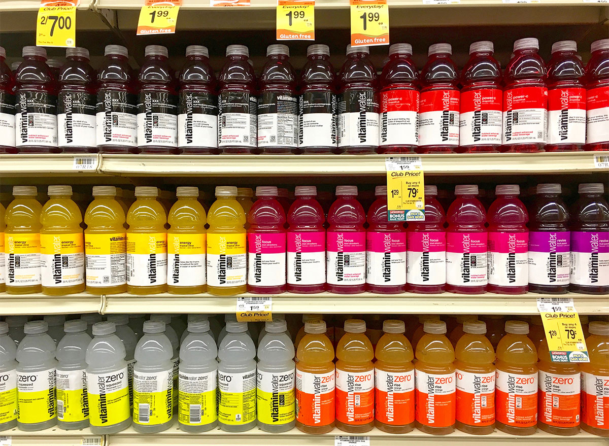 bottles of vitaminwater in store aisle