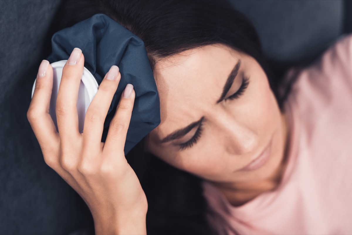 Woman covid migraine