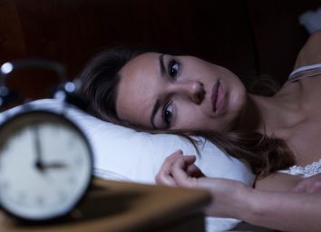 30-something woman having trouble sleeping