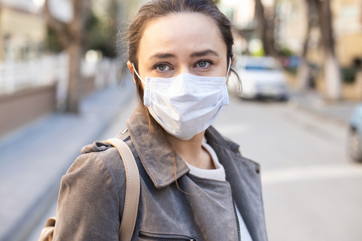 woman with face mask on the street
