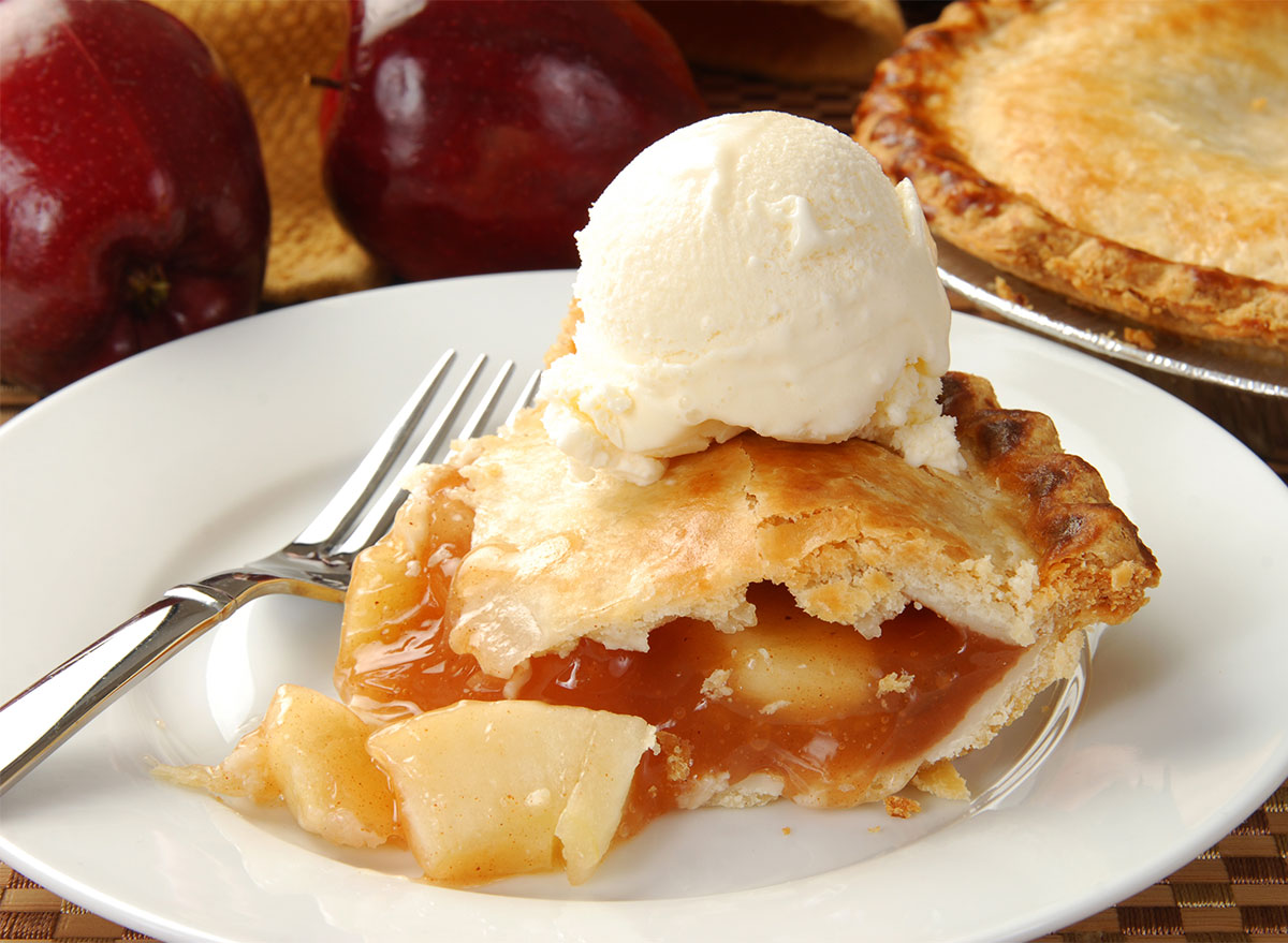 slice of apple pie topped with ice cream