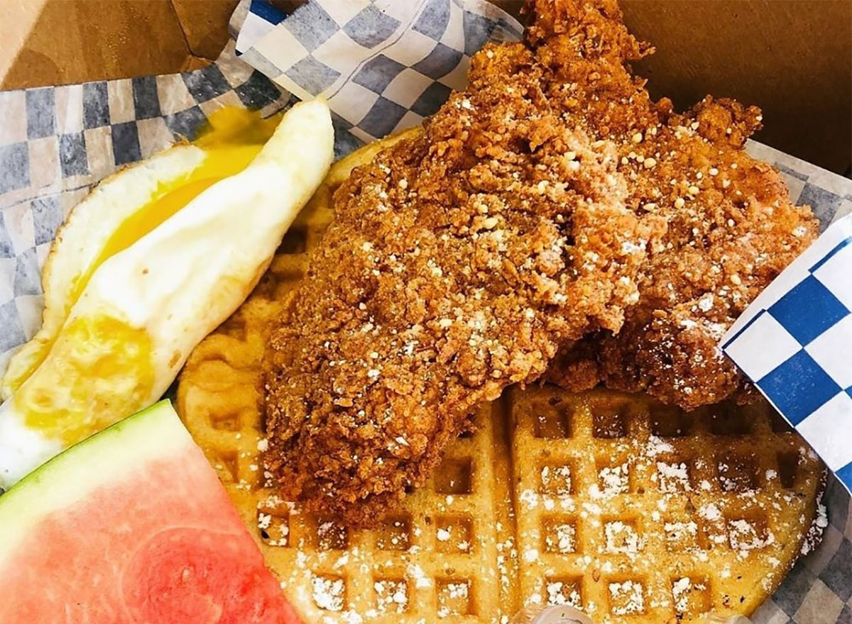 chicken and waffles with watermelon slice