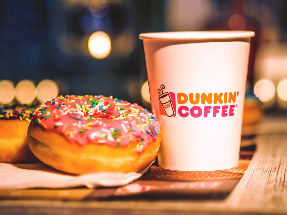 Dunkin donuts coffee cup and doughnut