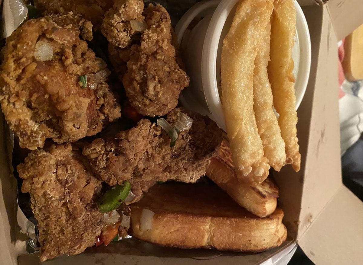 plate of fried chicken with french fries