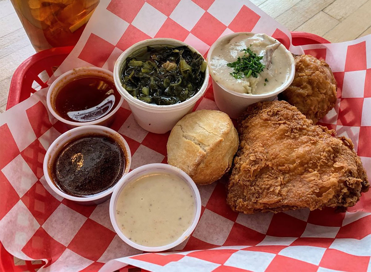 plate of fried chicken with dipping sauces