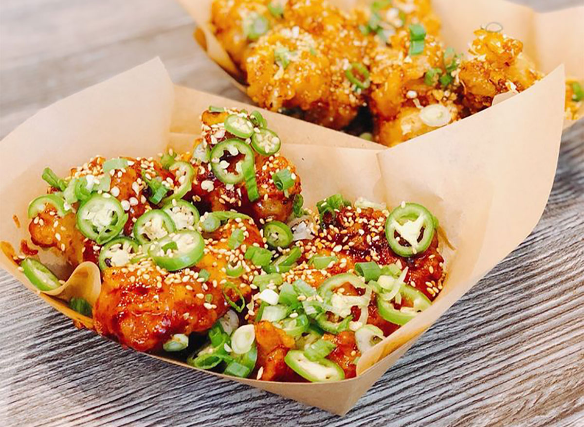 korean fried chicken topped with jalapeno slices