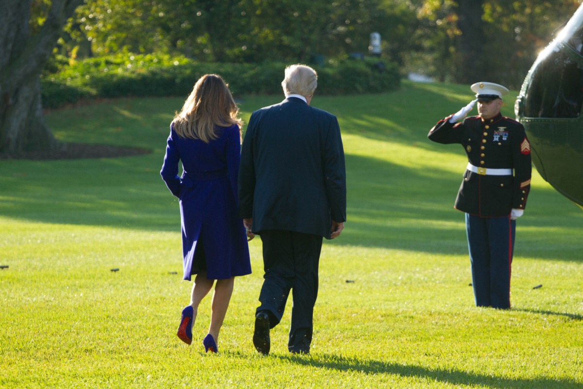 President Donald Trump and Melania Trump walking