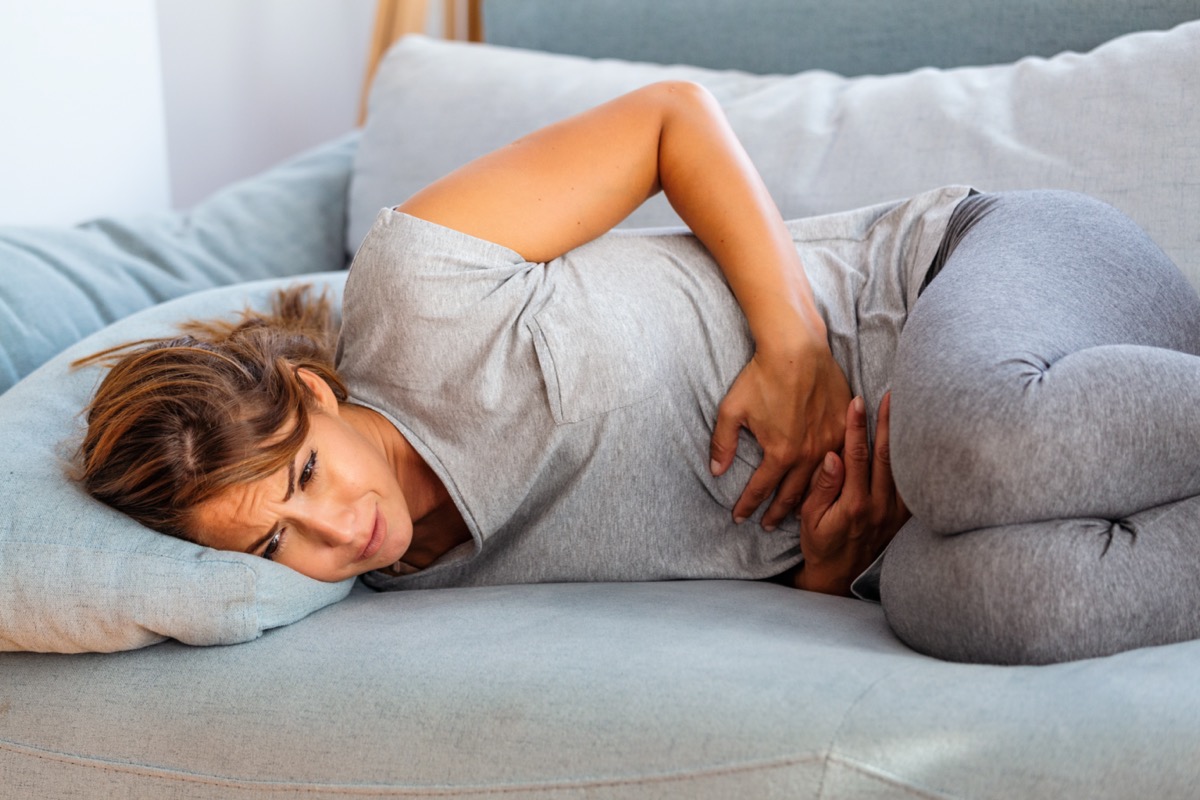 woman suffering from stomach pain