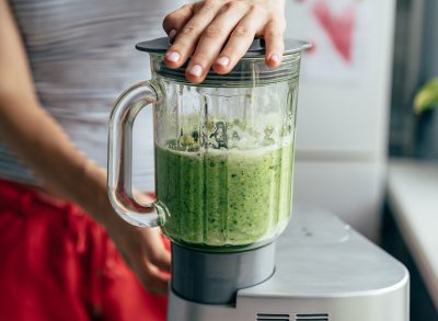 blending up ingredients for a green smoothie