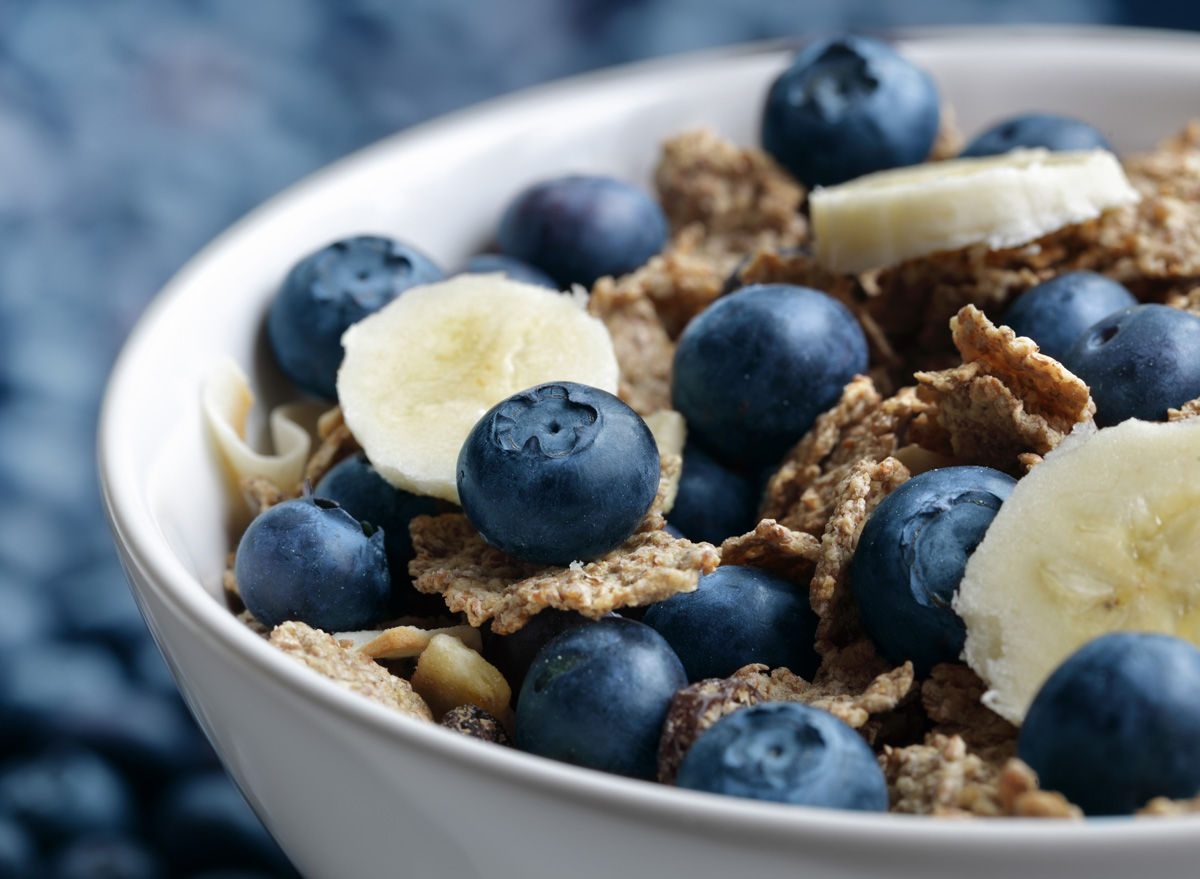 high fiber bowl of bran cereal with blueberries and bananas