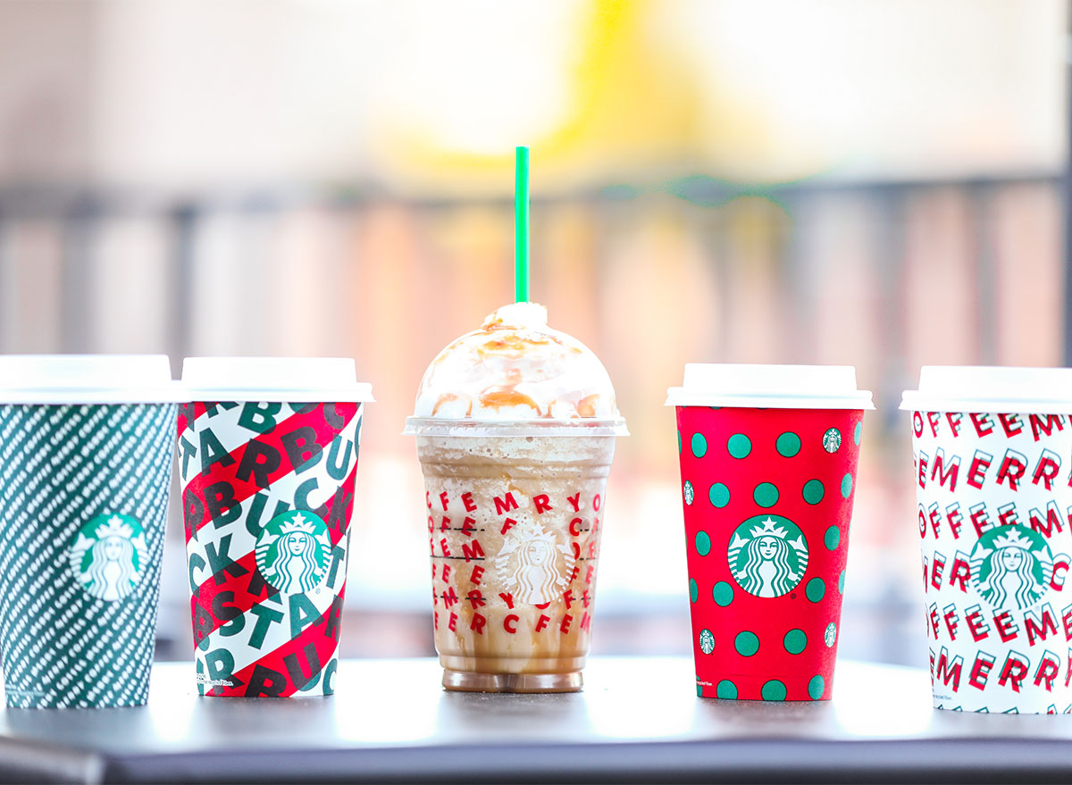 starbucks holiday cups with frappuccino and four hot drinks