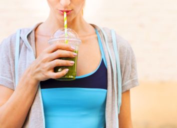 woman drinking smoothie