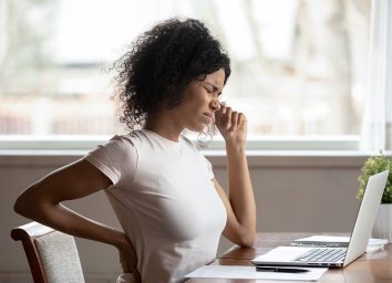 woman in pain sitting