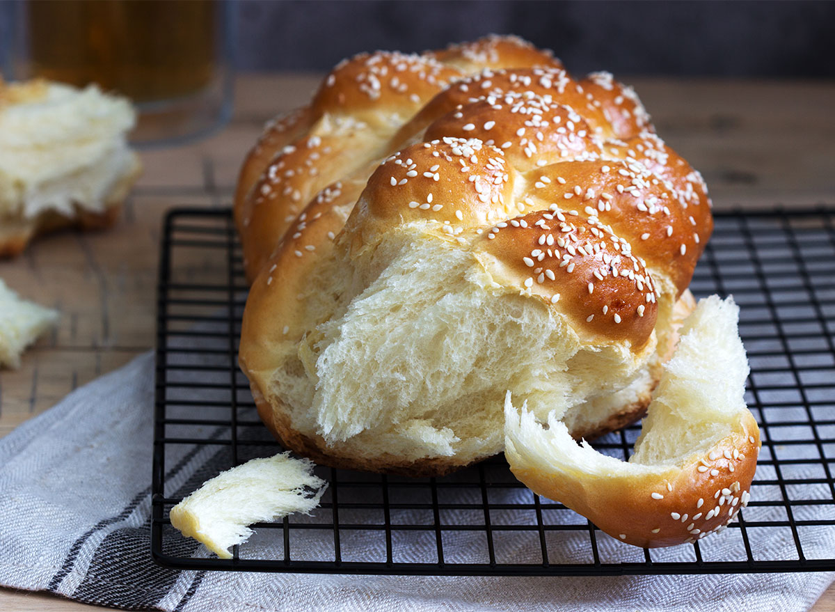 challah loaf on baking rack