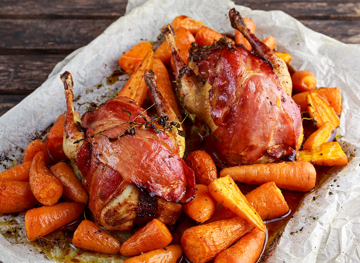 two roast pheasants with carrots