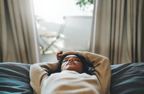 Signs You May Have Already Had COVID, Says CDC, Including Fatigue