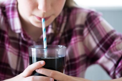 woman drinking diet soda