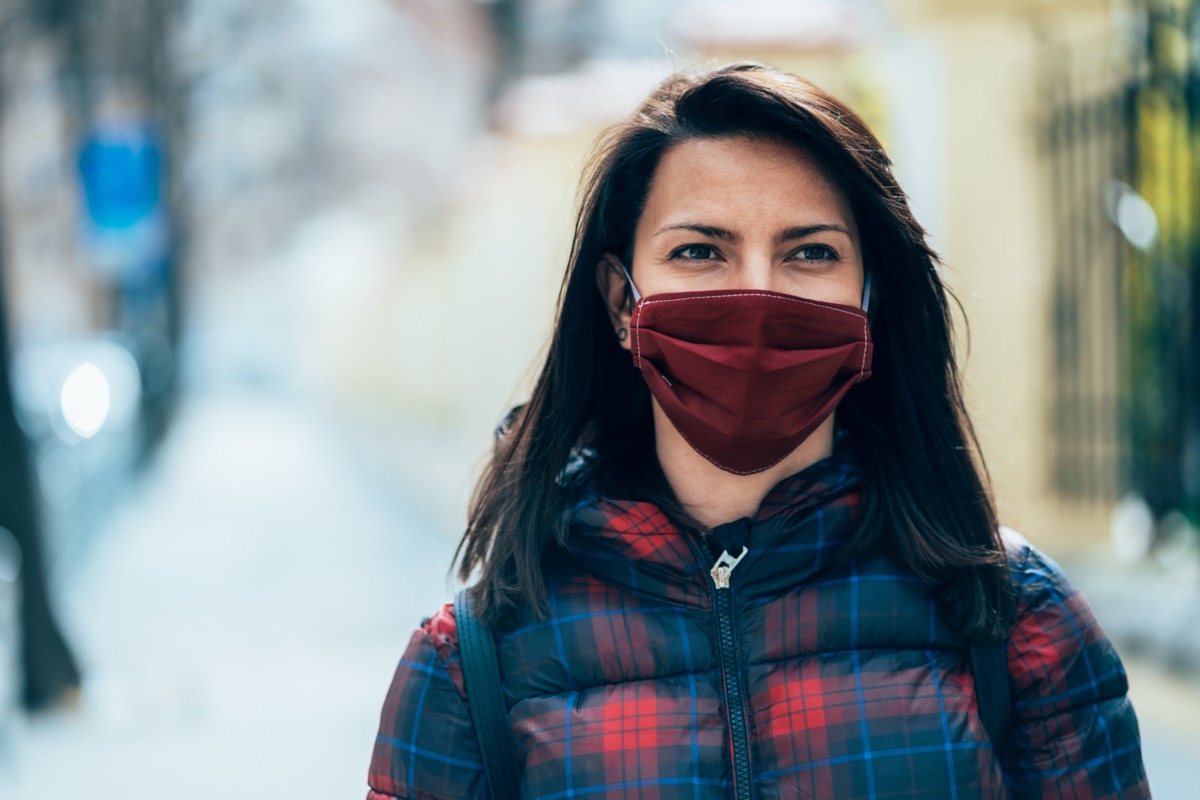 Woman with face protective mask